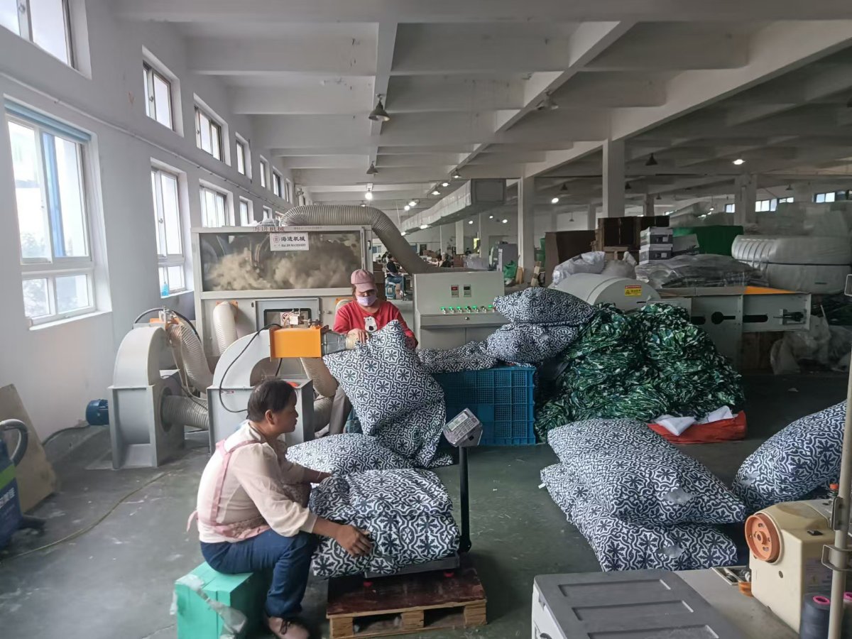 Workers assembling outdoor cushions on the BETTER-LIVING production line in Ningbo